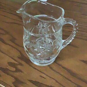 Clear Glass Pitcher with Intricate Design